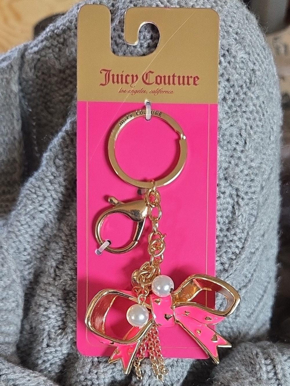 Juicy Couture Gold and Pink Enamel Bow Bag Charm